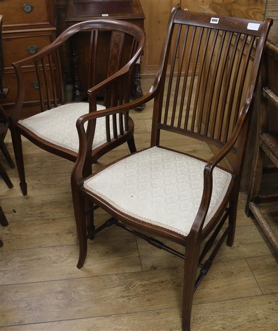 Two Edwardian inlaid mahogany tub shaped elbow chairs